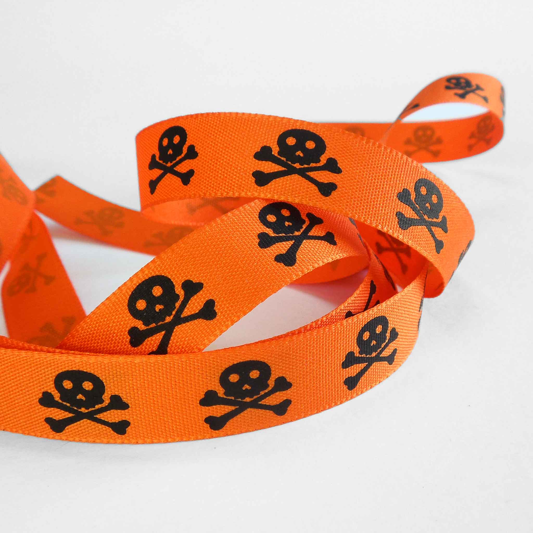 15 mm Skull and Crossbones Pirate Ribbon - Black/Orange- Berisfords