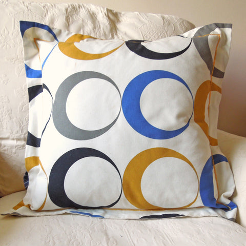 Circles Cushion, Handmade in a Cotton Blue and Gold Eclipse Print with Satin Stitch embroidery, inch 21 inch, x 53 cm