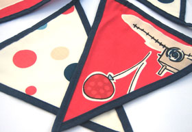 Red Boys' Toys Bunting Luxury Bunting, Handmade in Pure Cotton with Gingham Drawstring Bag